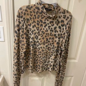 Lightweight cheetah sweater.